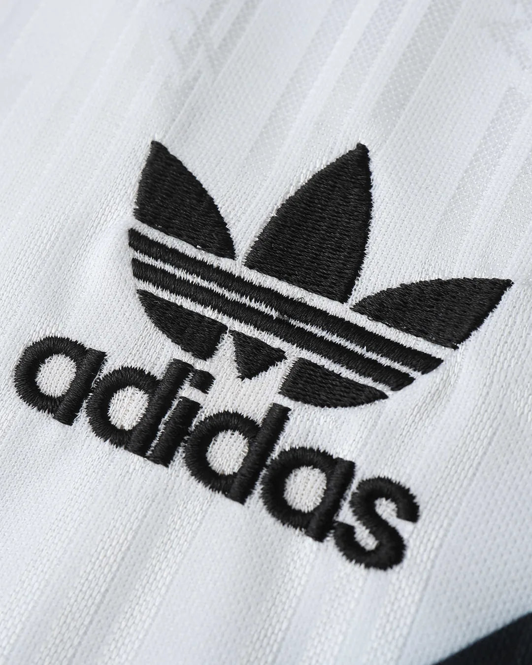 03-germany-1990-home-retro-jersey-detail-1.webp