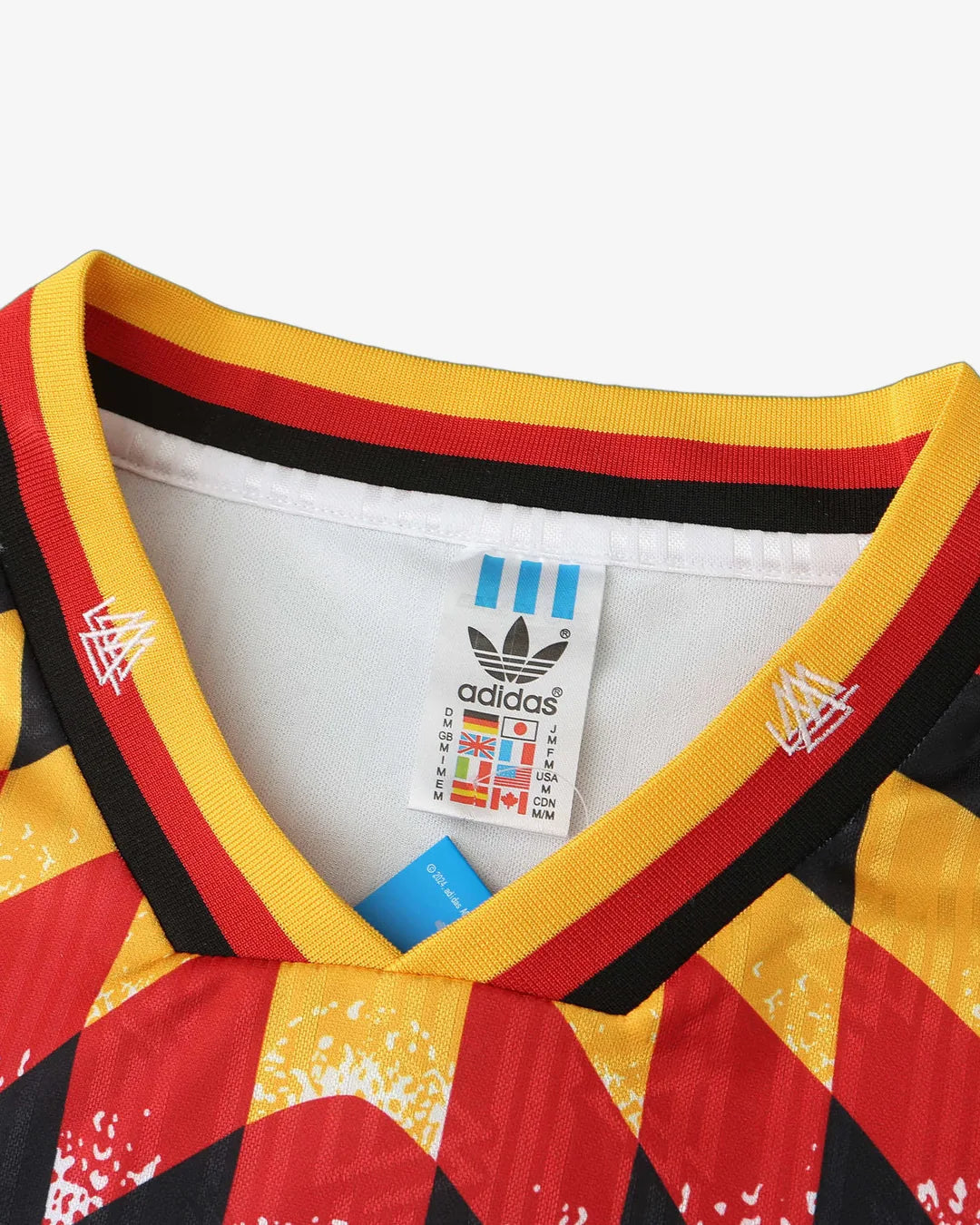 06-germany-1994-home-retro-jersey-detail-4.webp